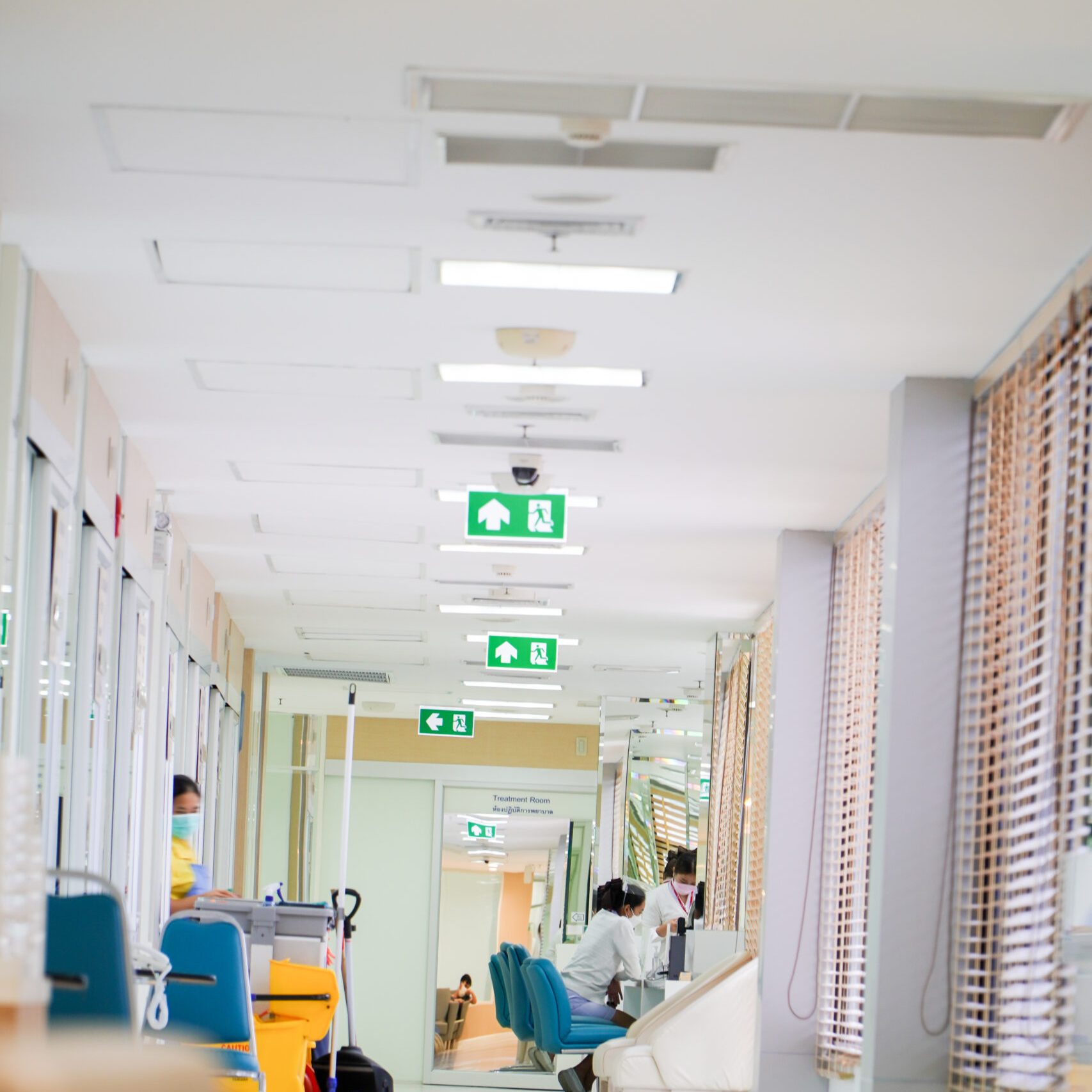 fire exit sign in hospital, Idea for event fire or evacuation drills. fire exit sign in hospital, Idea for event fire or evacuation drills.